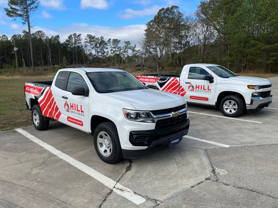 Hill Brothers Flooring Fleet Graphics - Different Truck Models with Similar Graphics